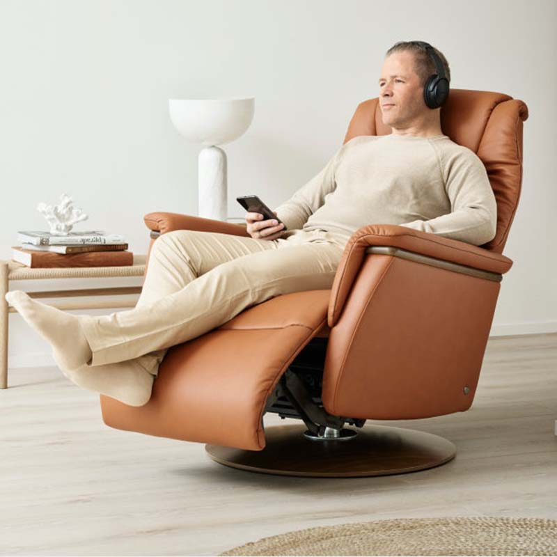 stressless max with man sitting in chair